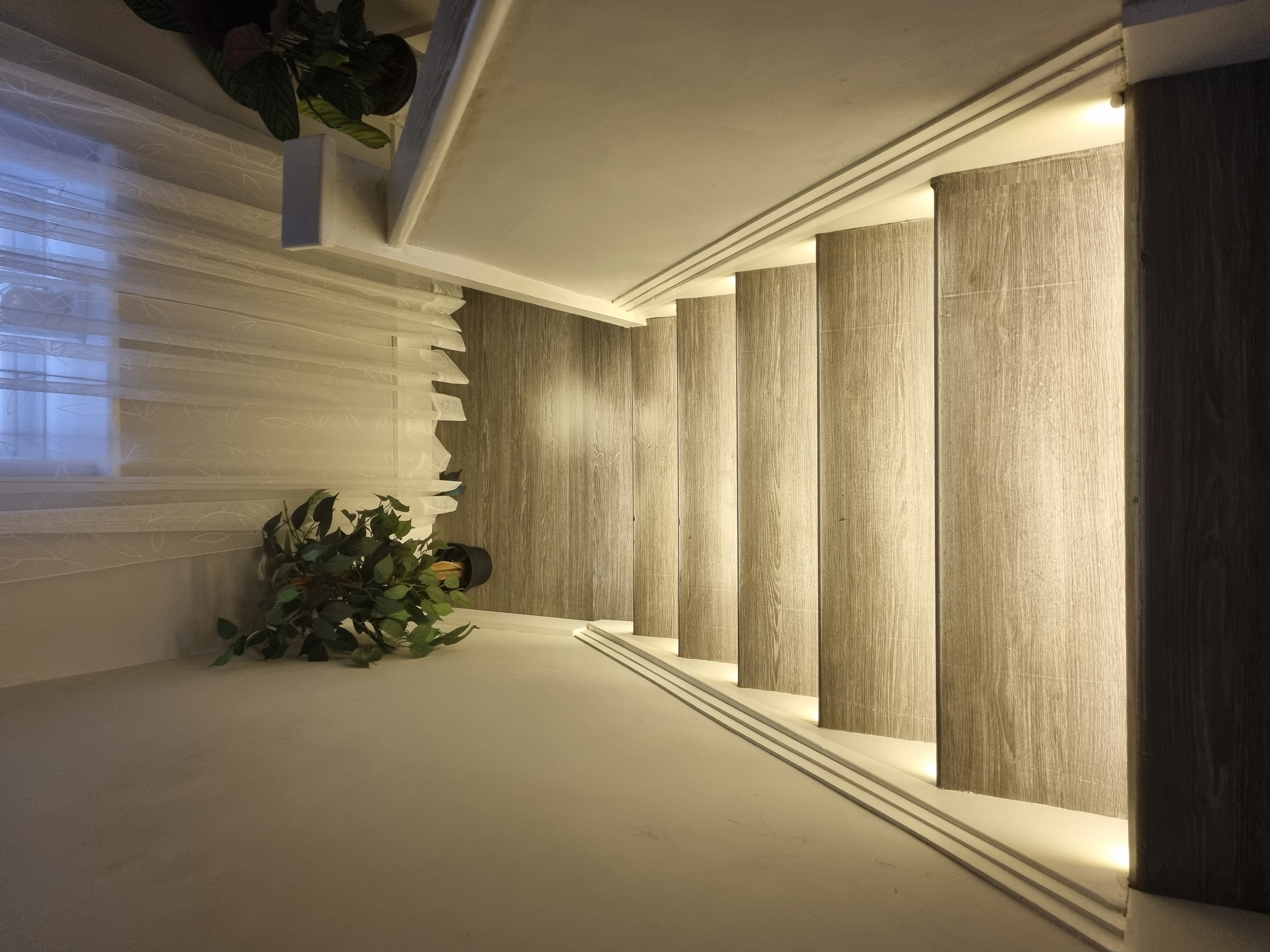 Smooth LED lighting animation sequence cascading down stairs